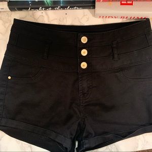 black high-waisted button-up shorts